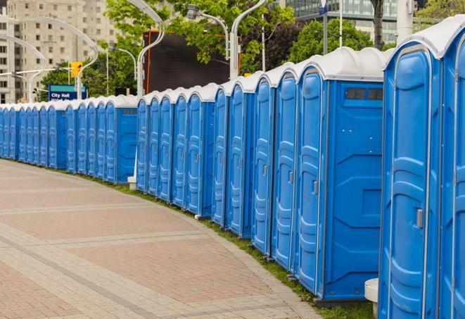 a row of portable restrooms set up for a special event, providing guests with a comfortable and sanitary option in Burnt Hills, NY